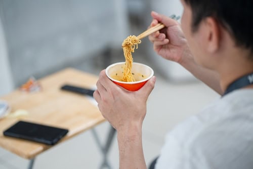 eating instant noodles